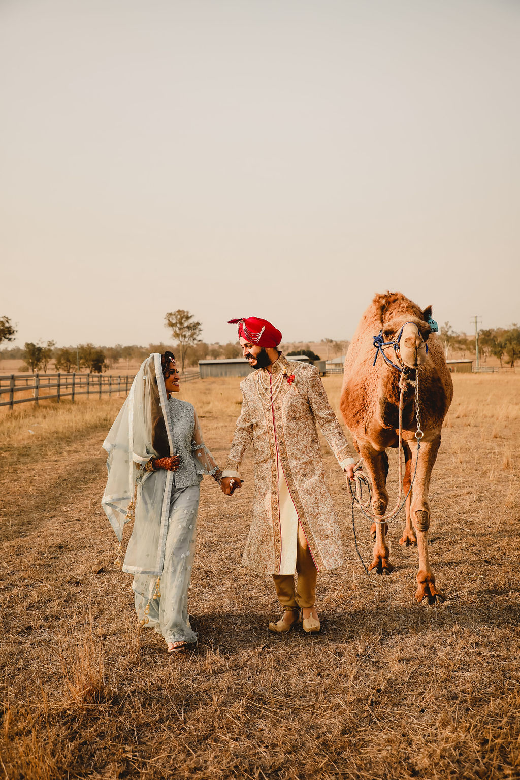 Brisbane Wedding Planner - Indian bride and groom leading a camel