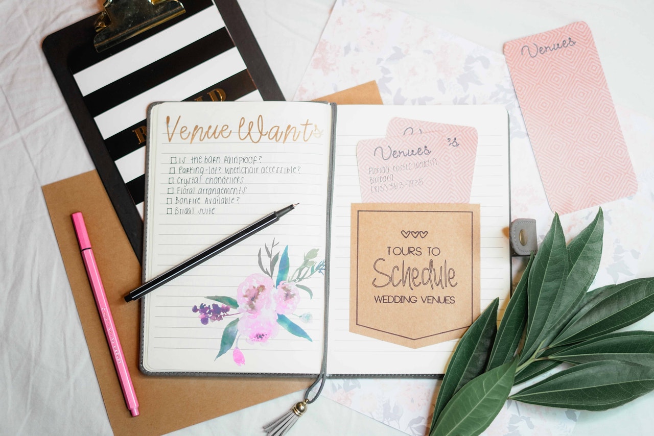 virtual wedding planning session – book and pen