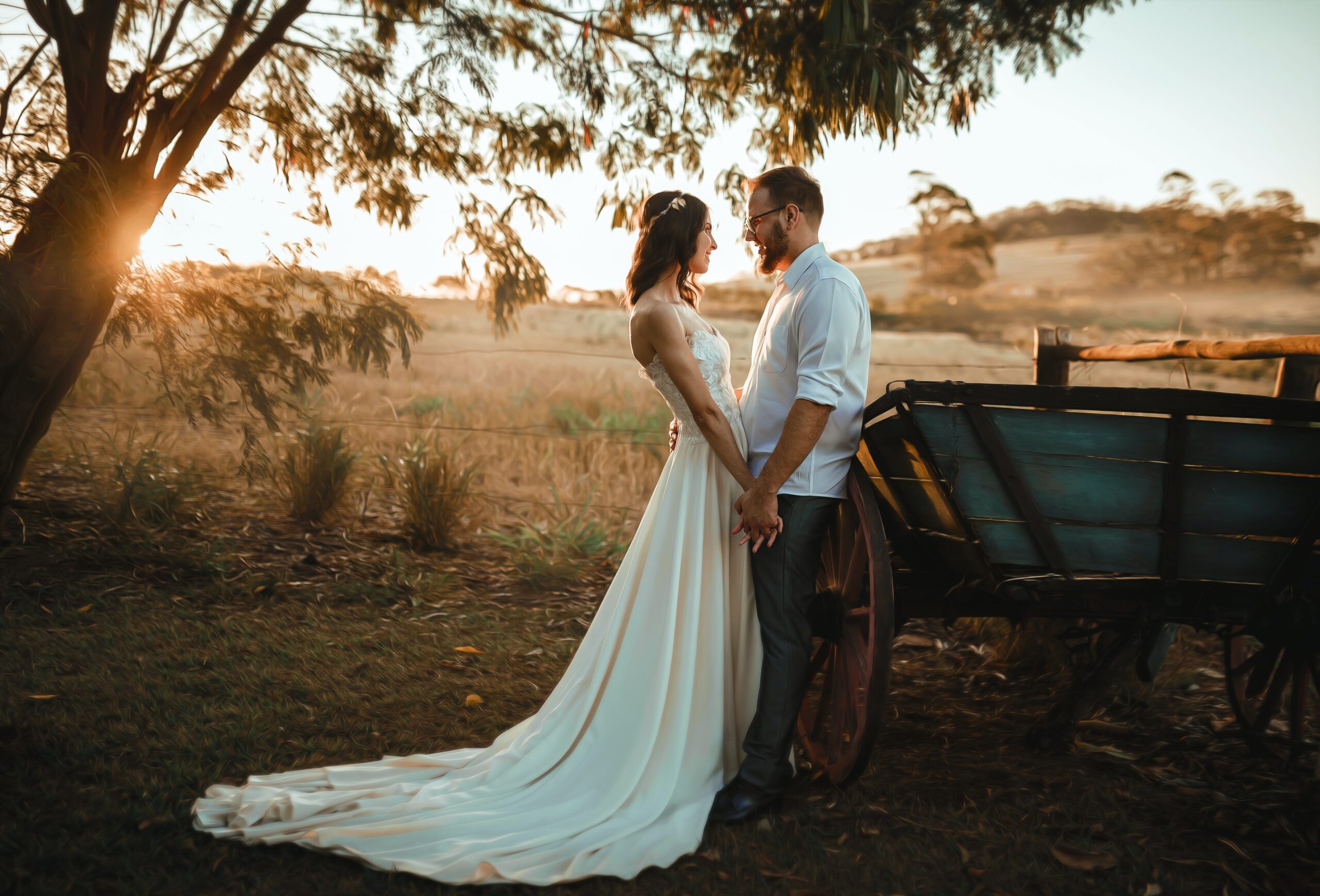 bride and groom in a field